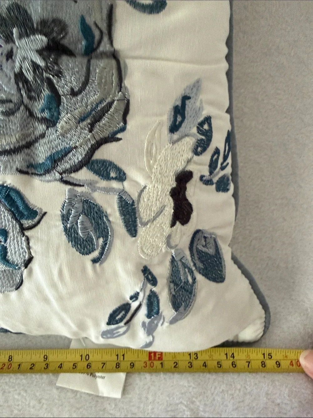 Madison Park Cream Throw Pillow with Blue and Gray Floral Embroidery